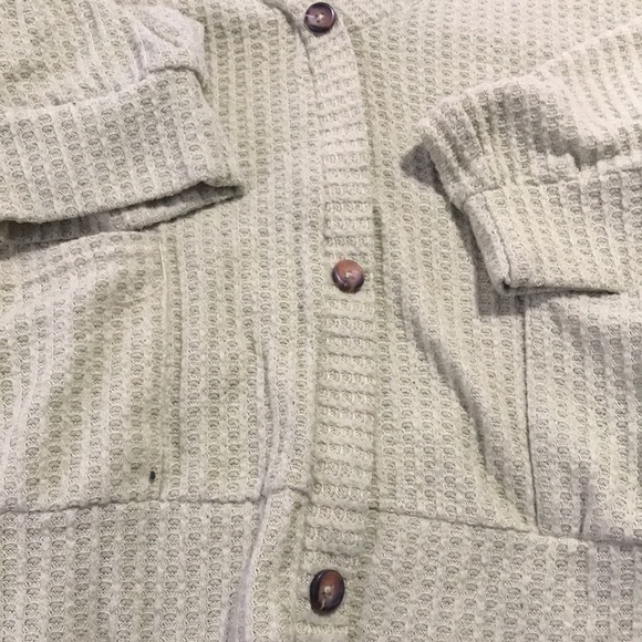 I’m selling a green long sleeve top. - Picture 2 of 6